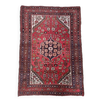 Ancien tapis en laine fait main