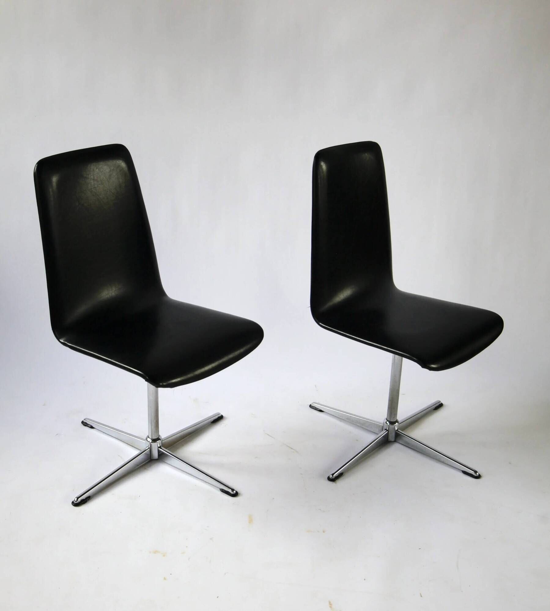 Pair of vintage swivel armchairs in black vinyl, 1970s