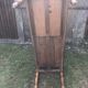 Antique farmhouse table in solid cherry wood with 2 drawers and 1 pull-out at the end with turned legs.