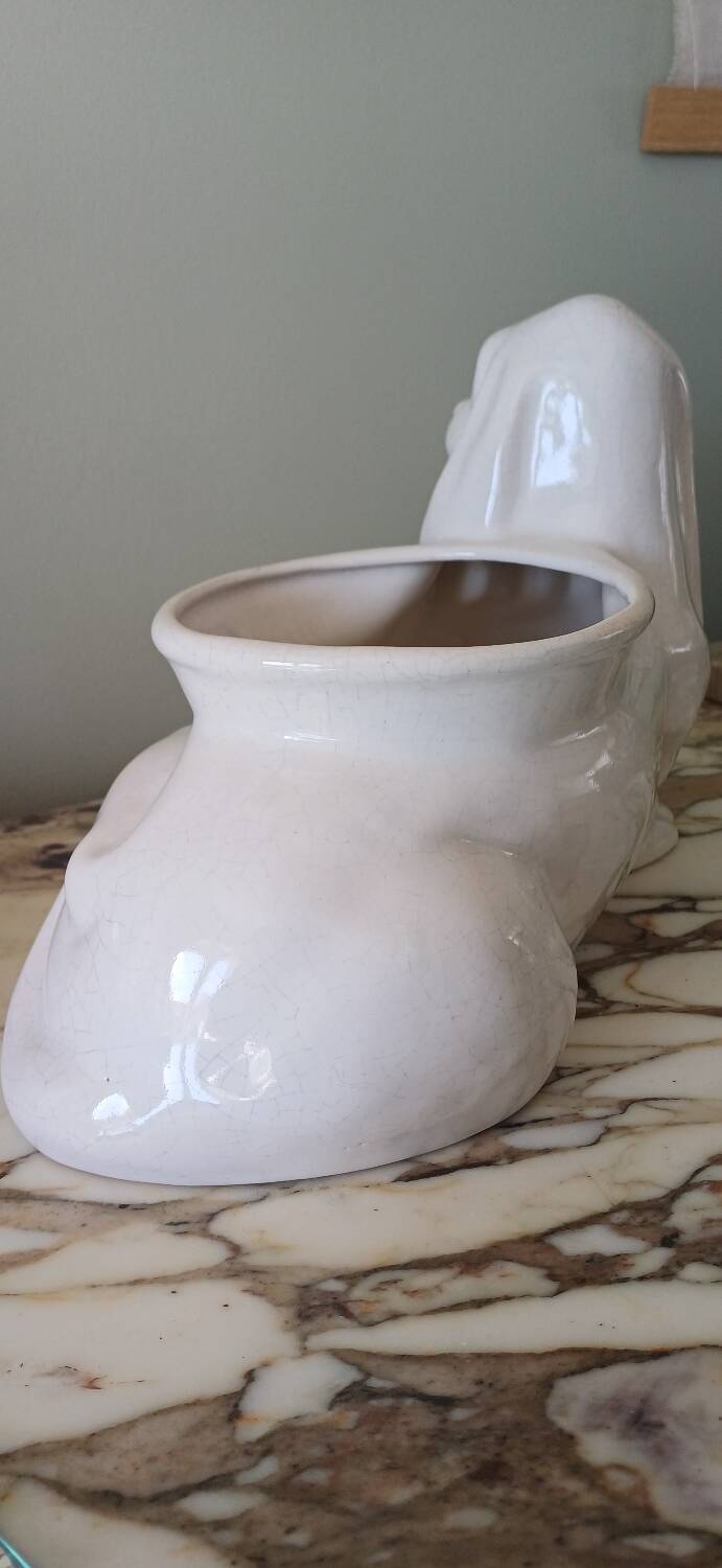 Cracked glazed faience in a zoomorphic design