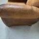 Antique 20th century tan leather club armchair