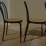 4 Chaises bistrot en métal noir et assise cannage plastique