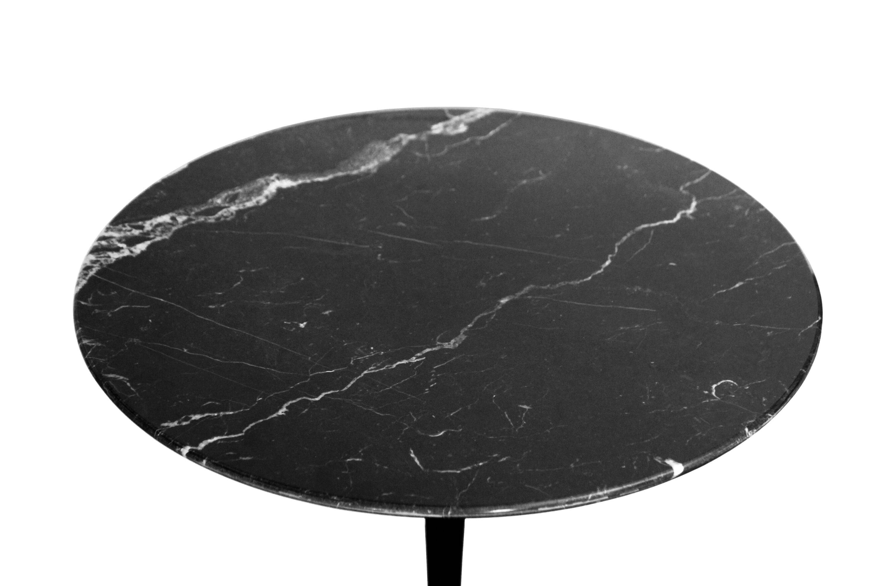 Tulip Knoll pedestal table in black Marquina marble, by Eero Saarinen