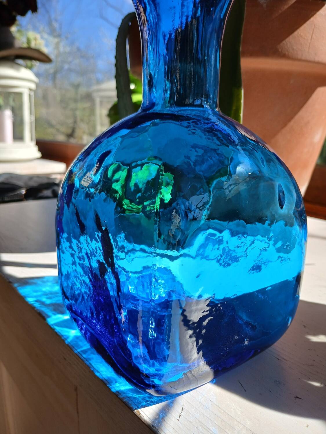 Blue embossed glass carafe