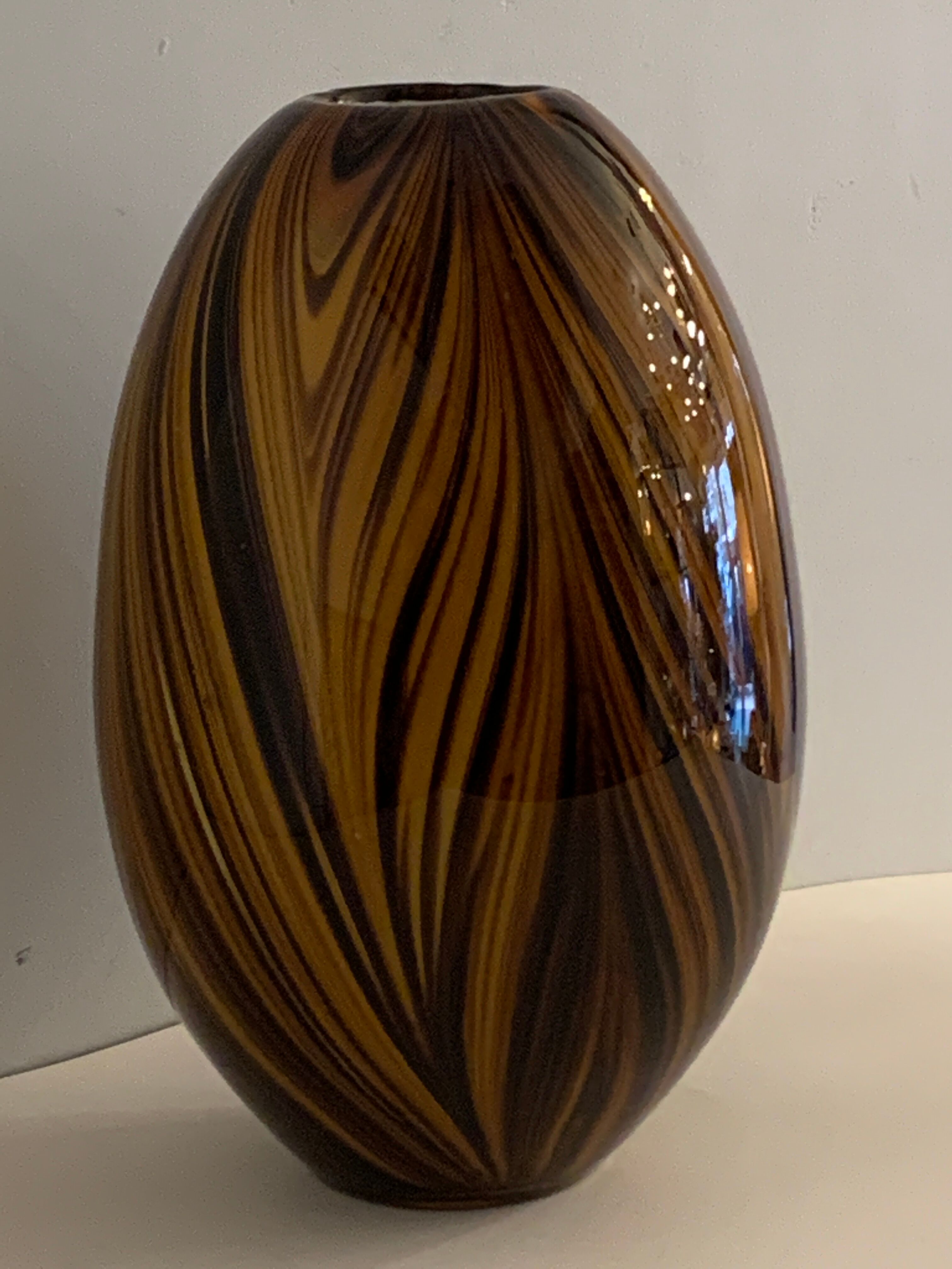 Yellow and black glass vase