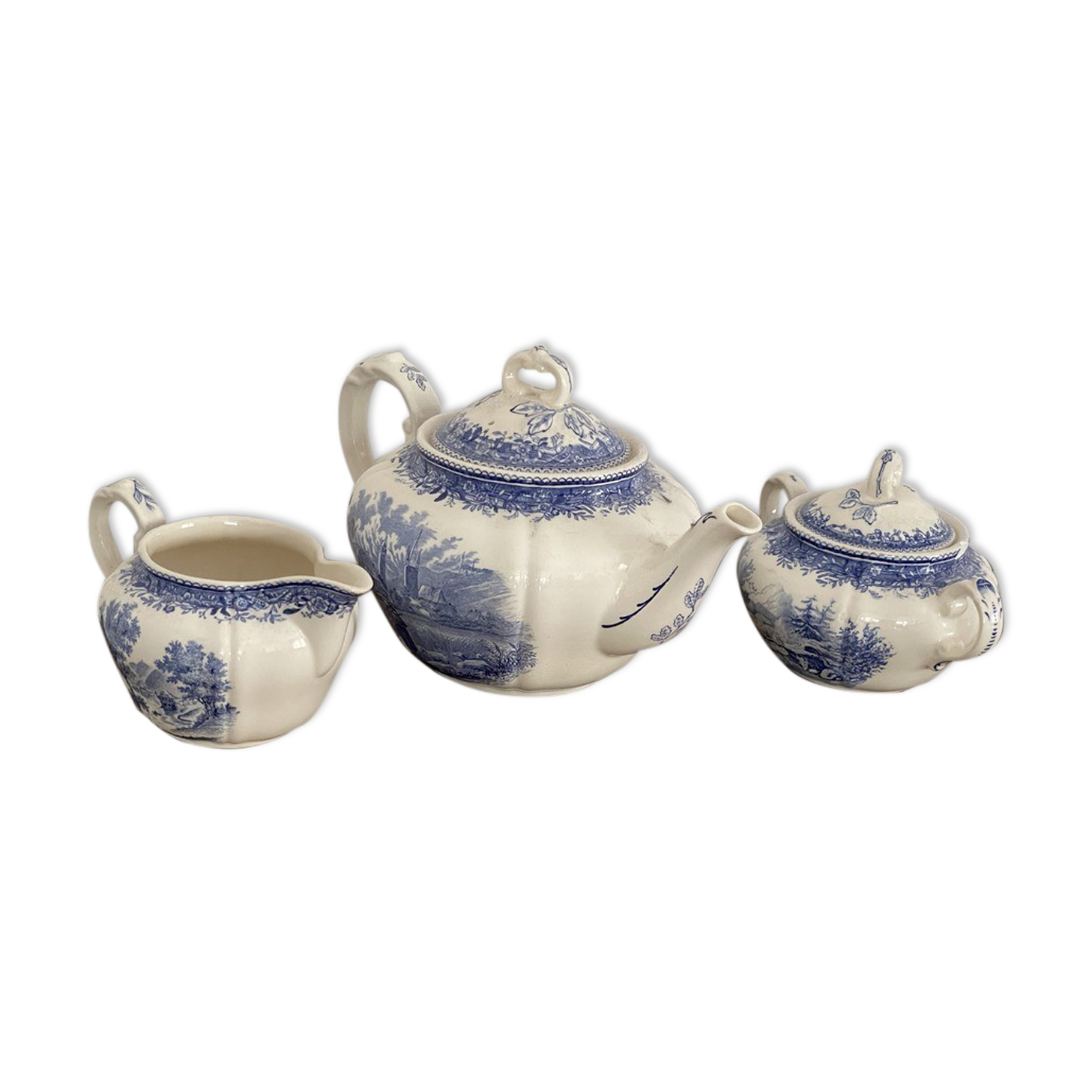 Teapot, milk pot and sugar bowl