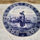 Round dish hollow Delfts decorating shepherdess and her sheep