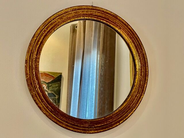 Old mirror in gilded wood early twentieth century