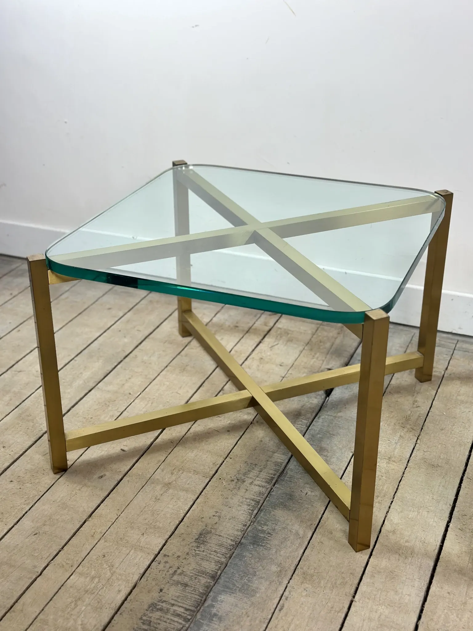 Pair of Italian brass and glass side tables from the 1970s.