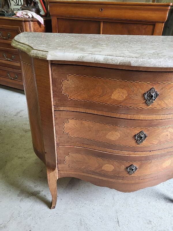 Curved chest of drawers in rosewood and marble marquetry