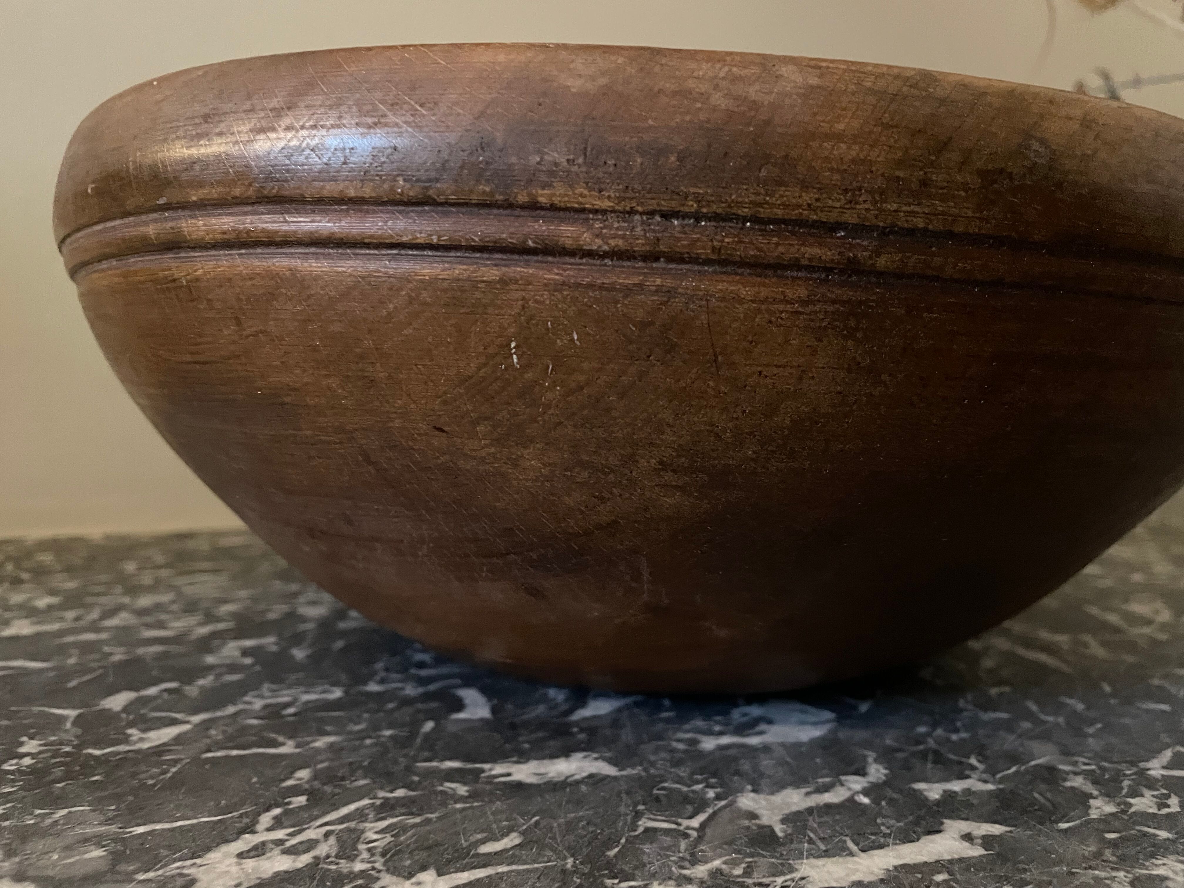 Raw wooden salad bowl