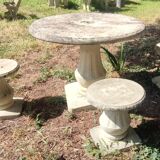 Old garden furniture in reconstituted stone