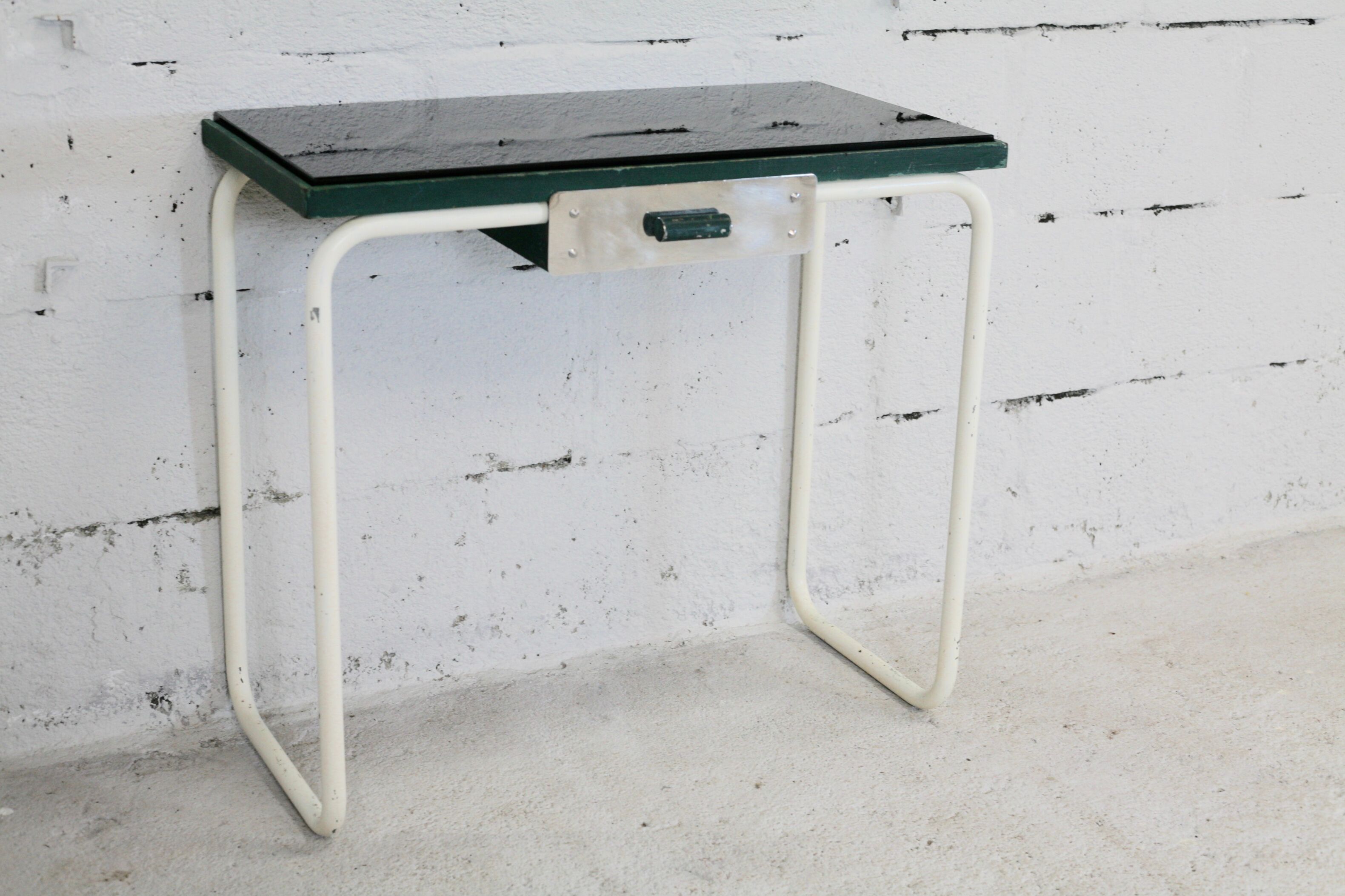 Tubular steel console, black glass tray, circa 1950