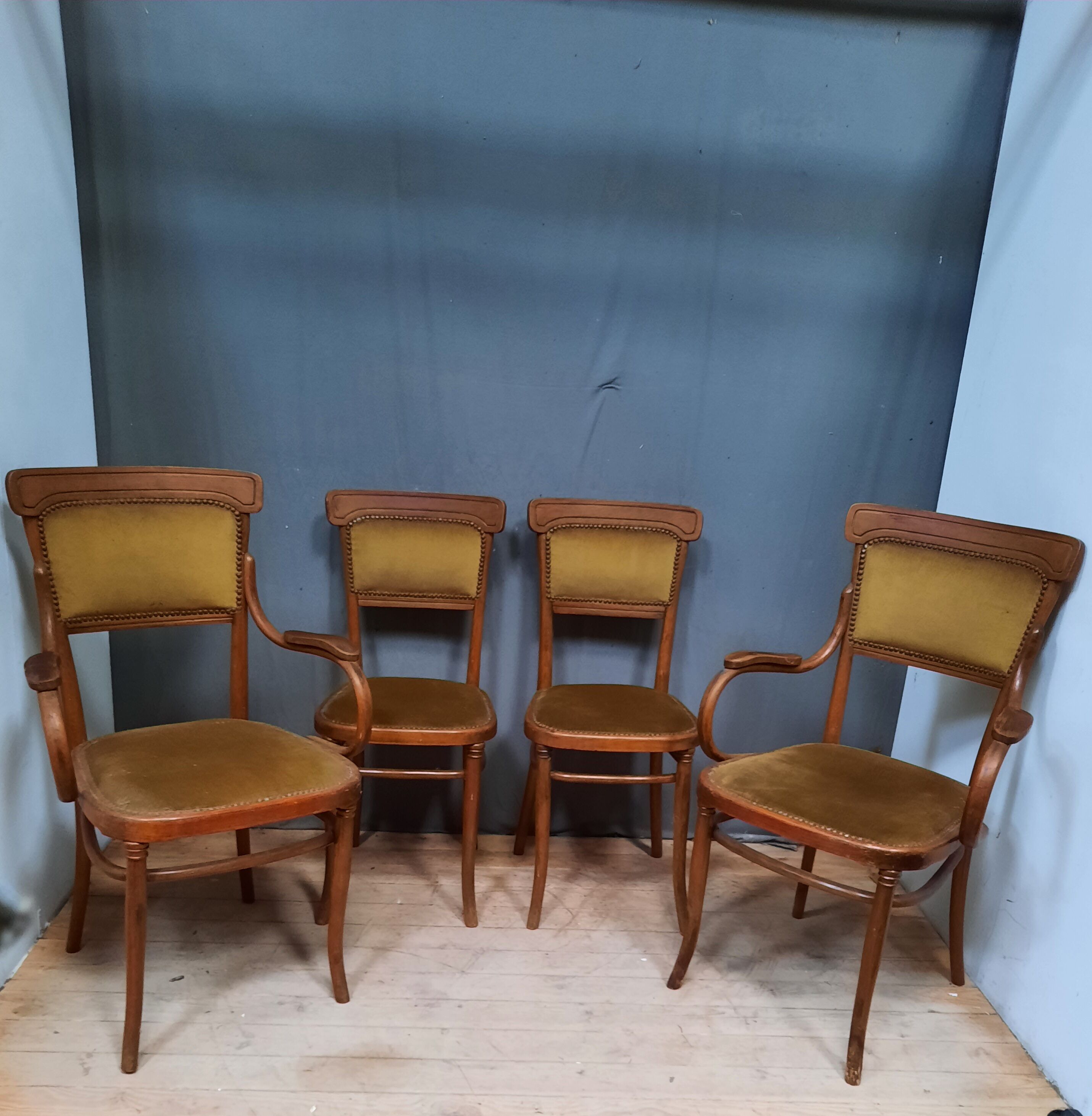 Pair of armchair and chair in curved wood