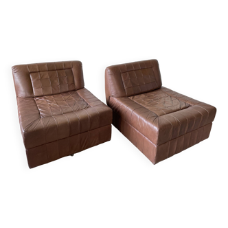Pair of brown patchwork leather armchairs by Percival Lafer, Brazil, circa 1970.