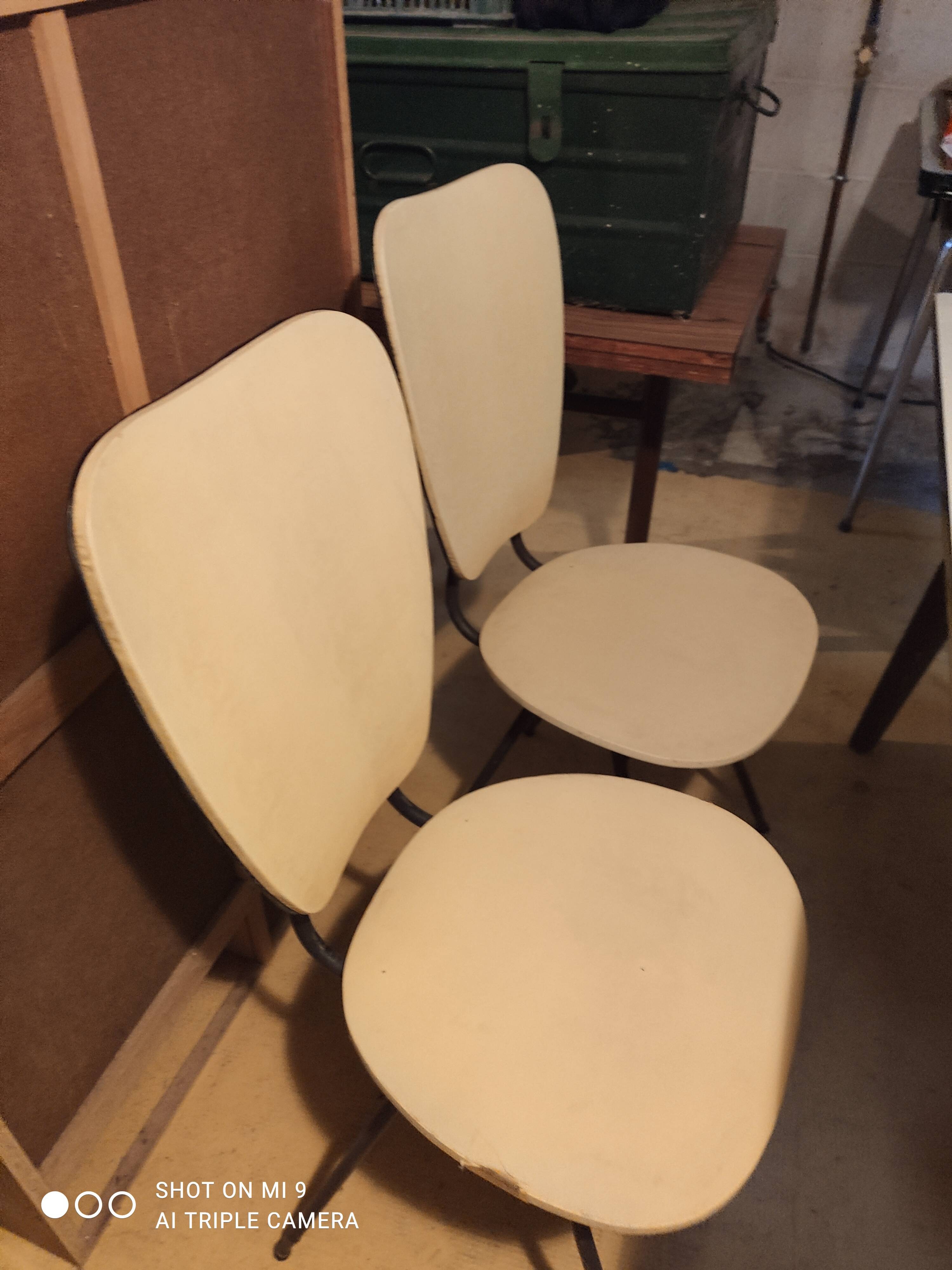 Formica table and coloured chairs