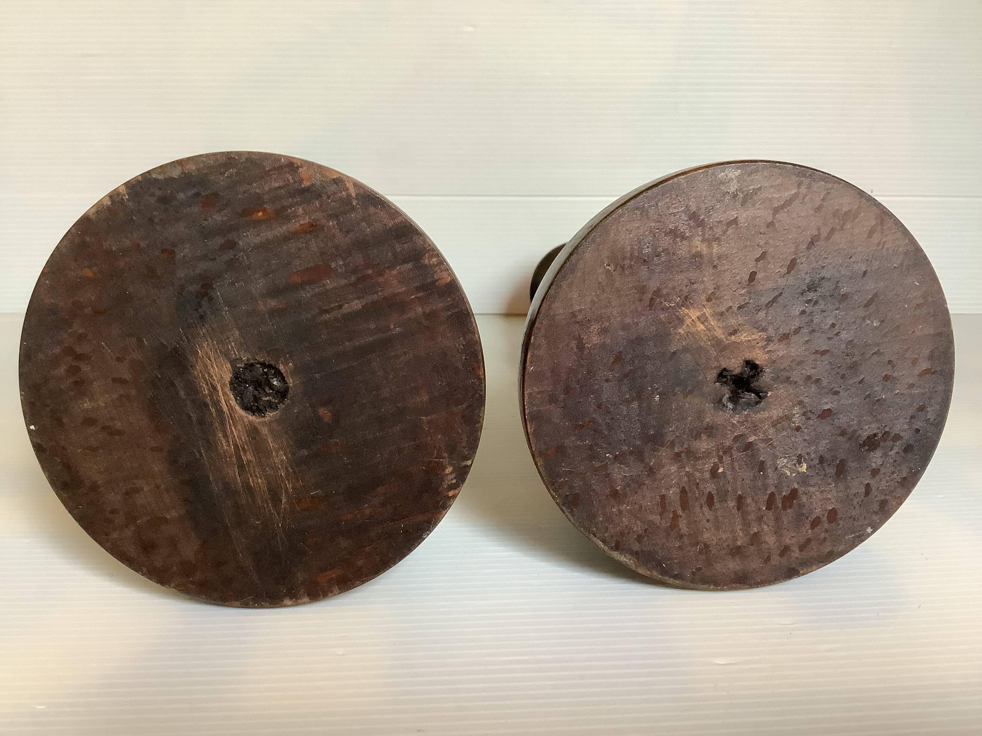 Pair of old wooden candlesticks