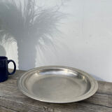 Round silver-plated metal serving dish with hallmark
