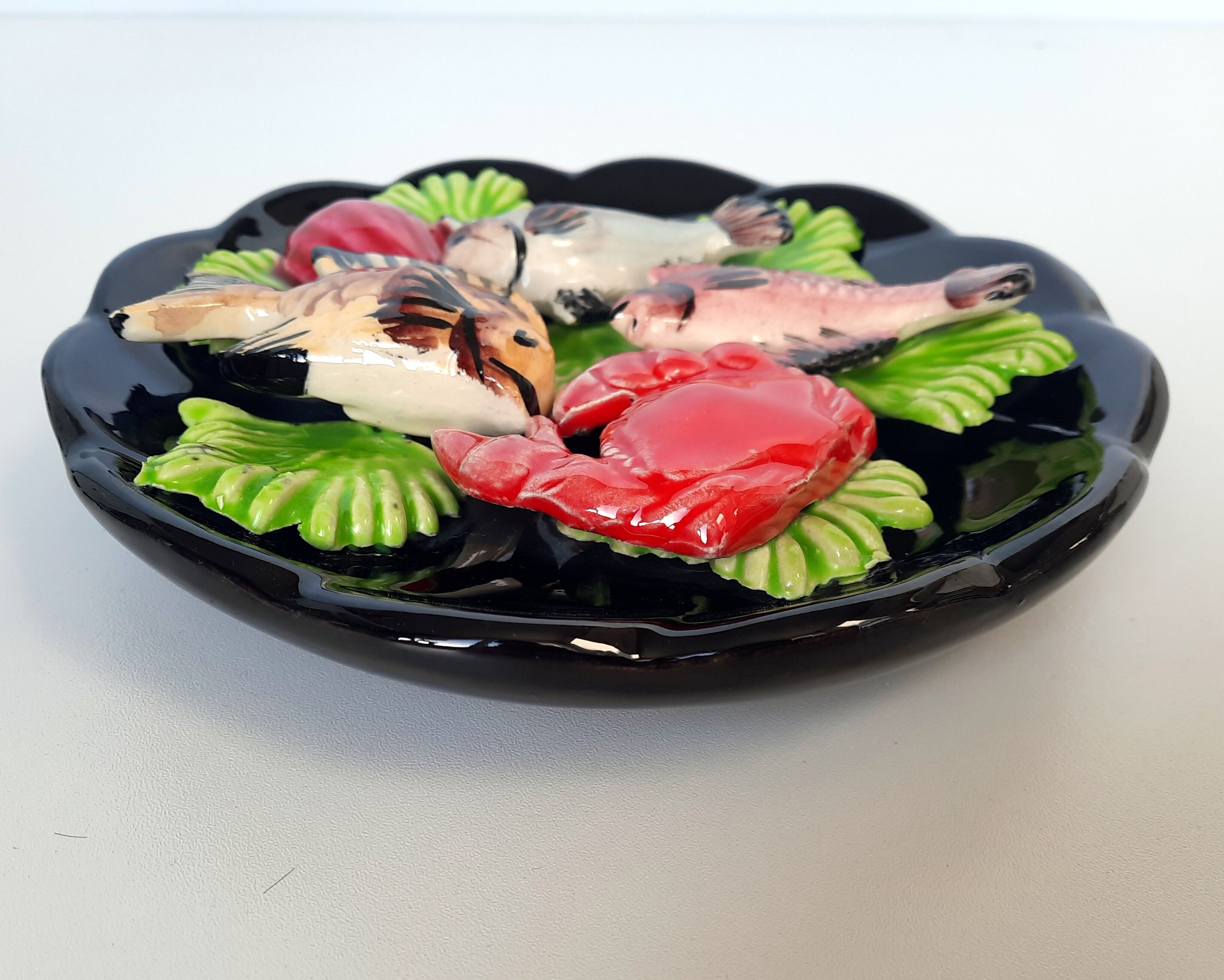 Flat wall plate ceramic Vallauris. Fish, crab, shellfish