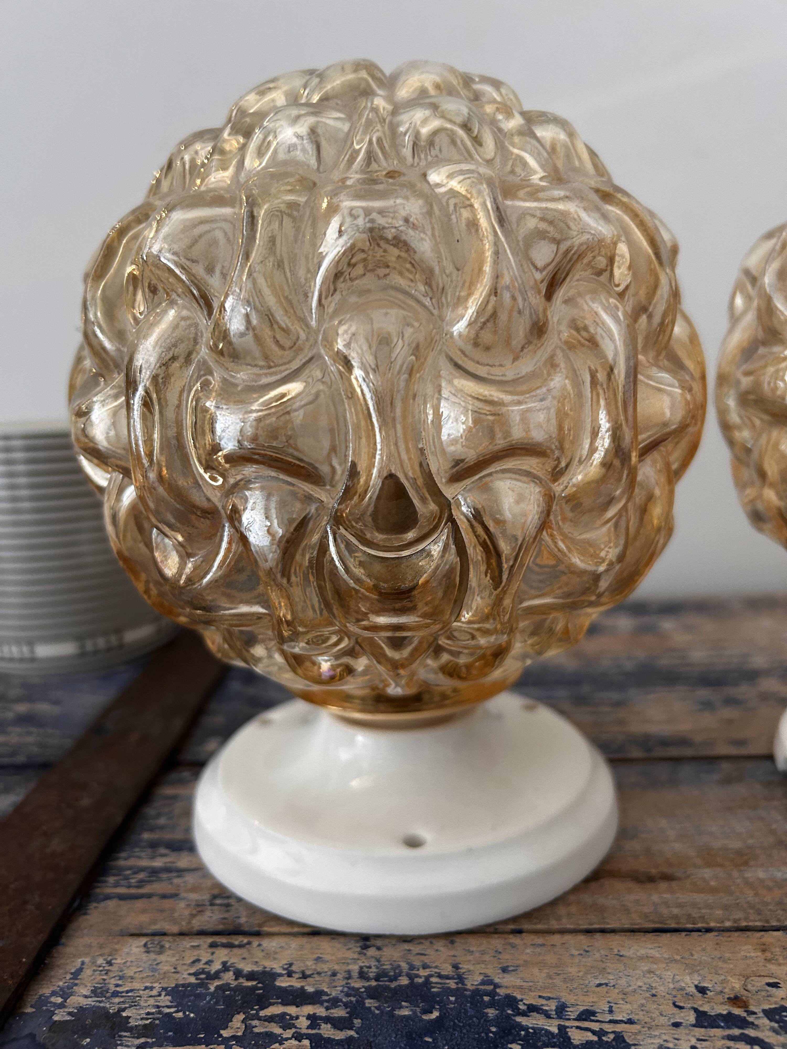 Trio of golden globe wall or ceiling lights