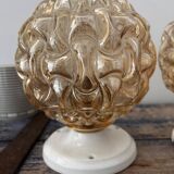 Trio of golden globe wall or ceiling lights