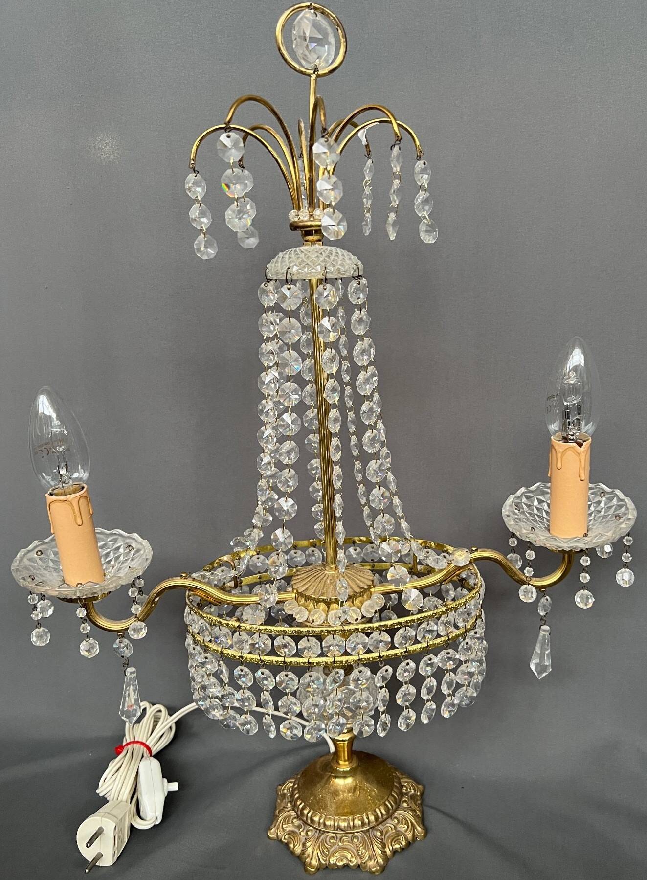 Girandole. Brass, crystal, bronze.