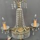 Girandole. Brass, crystal, bronze.