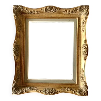 Old gilded carved wooden wall frame