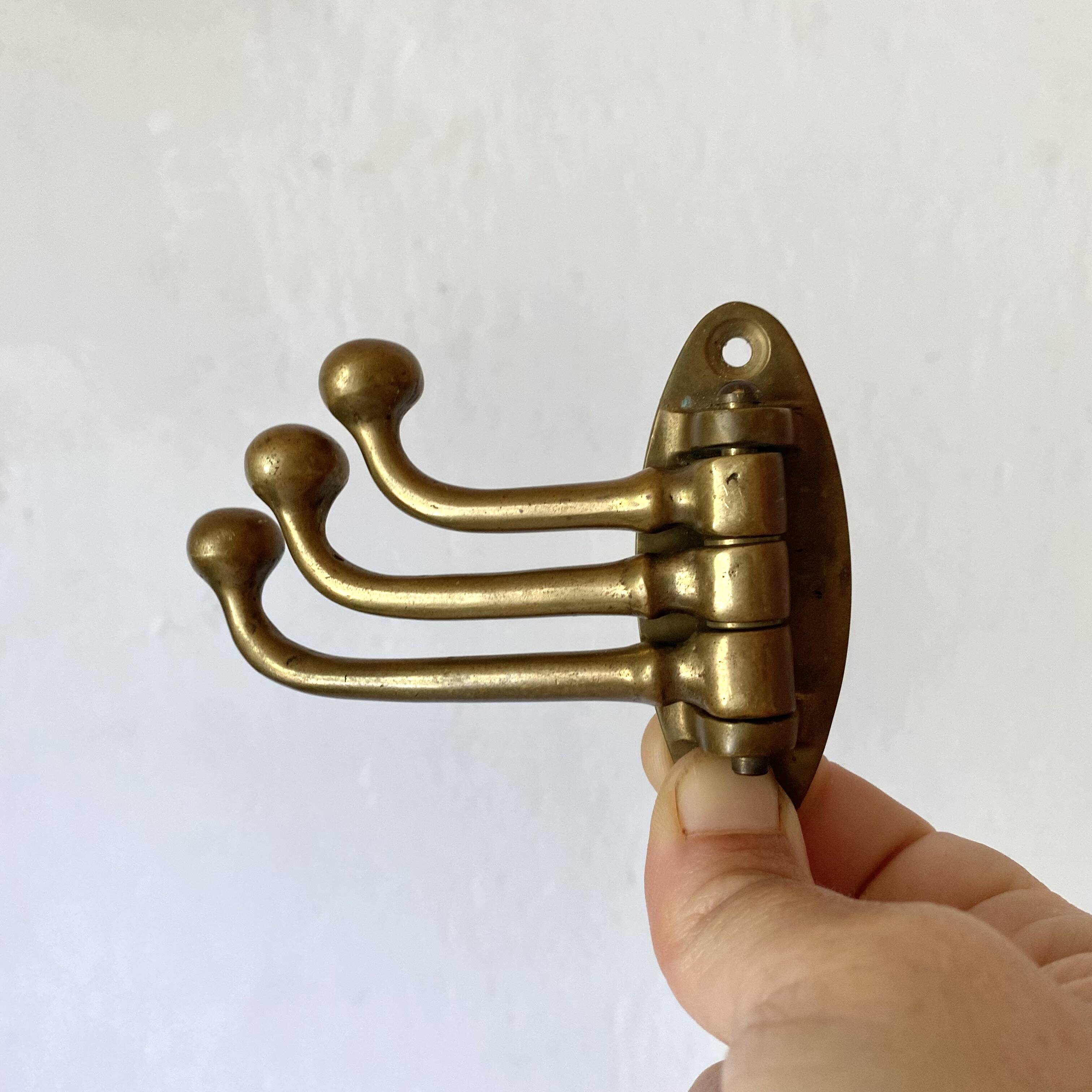 Triple hook brass coat rack