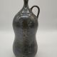 Bottle in iridescent green sandstone from the ceramist jean aimé Poirier