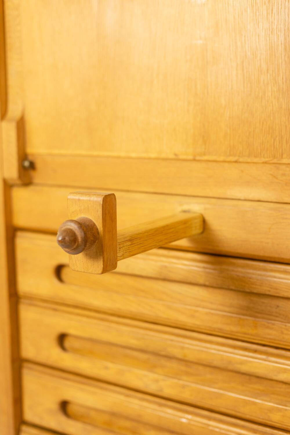 Guillerme and Chambron. Oak wardrobe with integrated secretary. 1970-80.