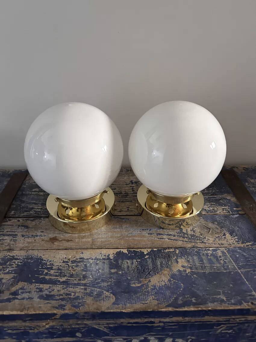 Set of two white opaline ball wall lights