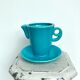 Milk jug on plate