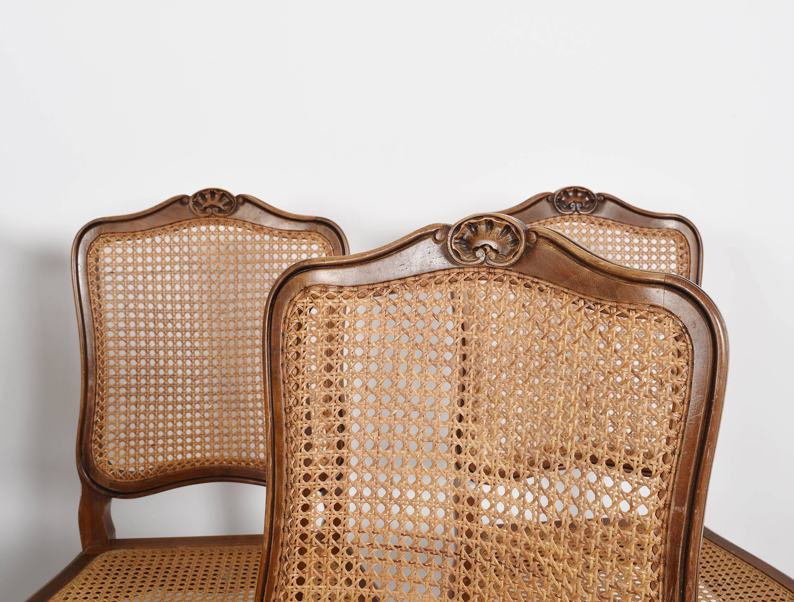 Series of 5 cane chairs, backs and seats, Louis XV style