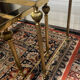 Series of 3 empire style nesting tables in brass and glass