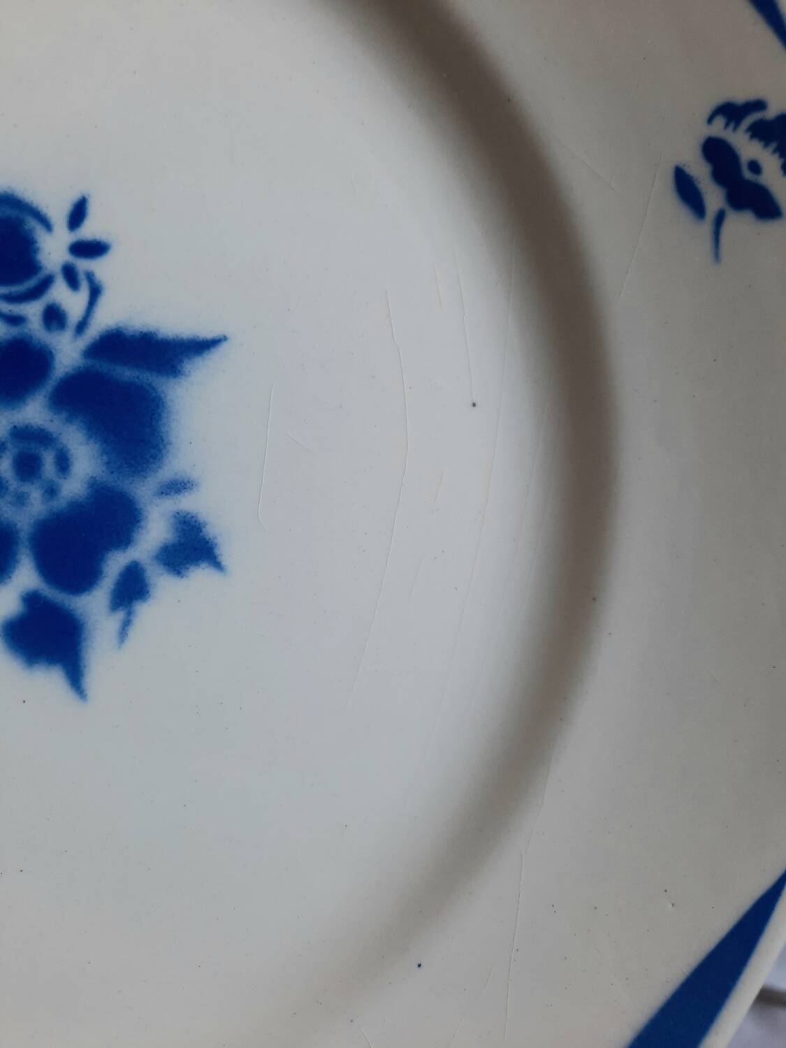 Old mismatched earthenware dinner plates