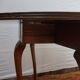 A half-moon english mahogany games table