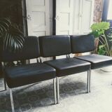 3 black armchairs