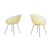 Set of two vintage fiber glass shell chairs