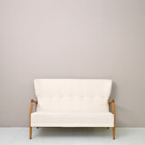 Vintage Scandinavian sofa with faux lambskin