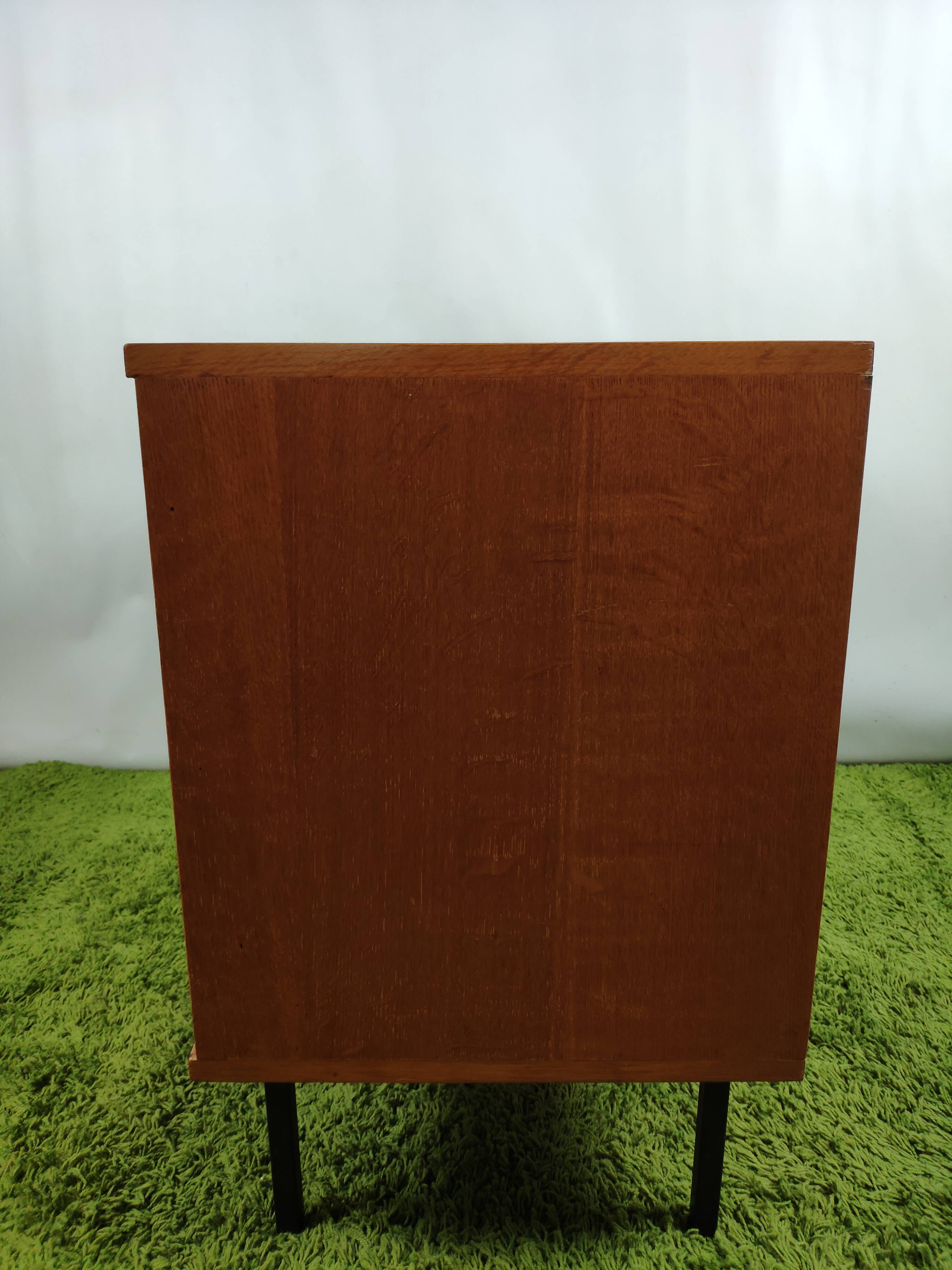 Wooden chest of drawers with gilded handle