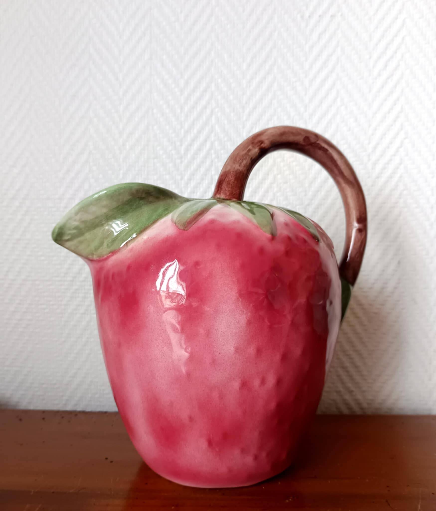 Vintage strawberry slipware pitcher