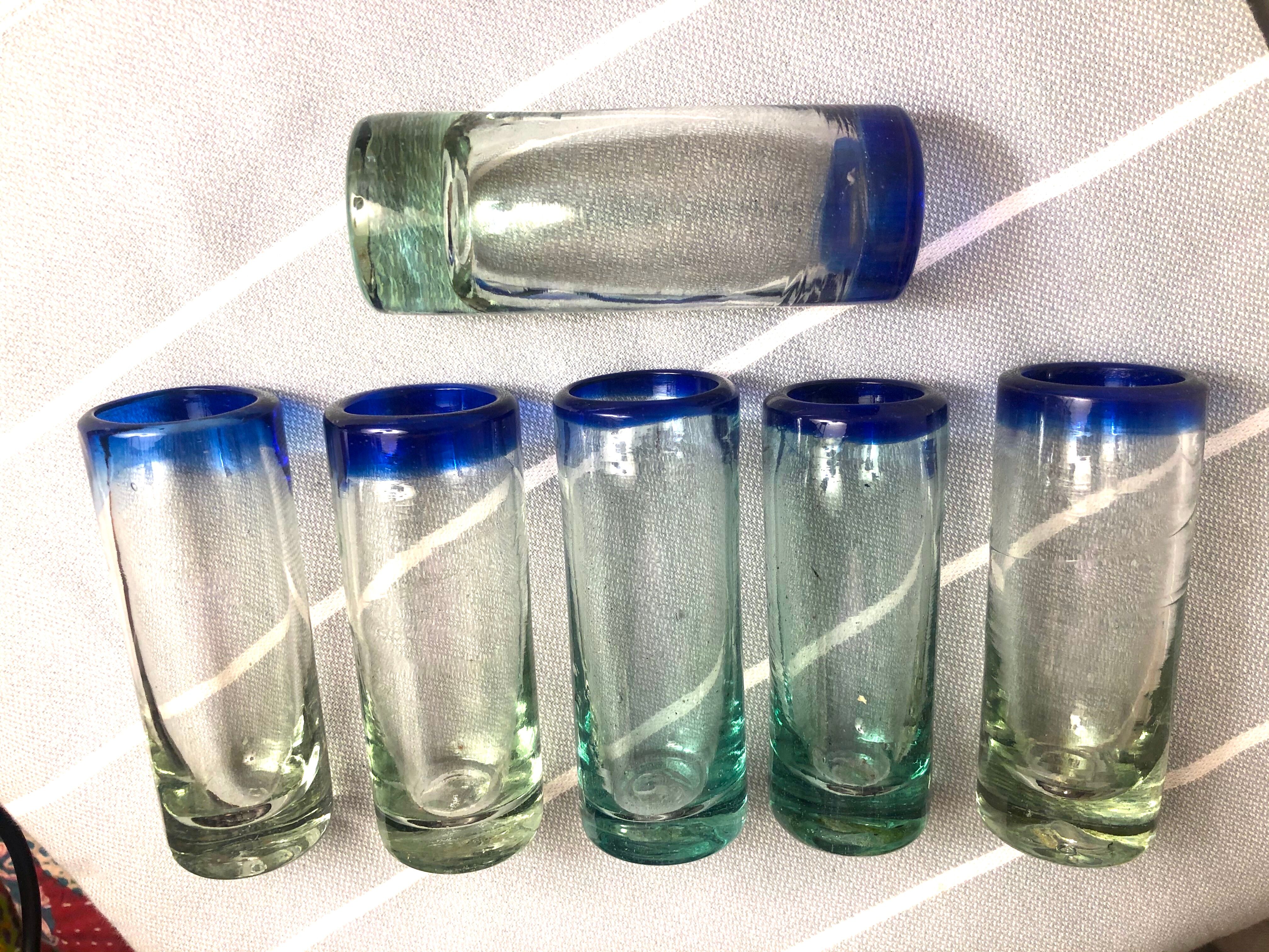Handmade cobalt blue tequila glasses made of recycled glass