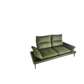 Green velvet sofa with removable backrests.