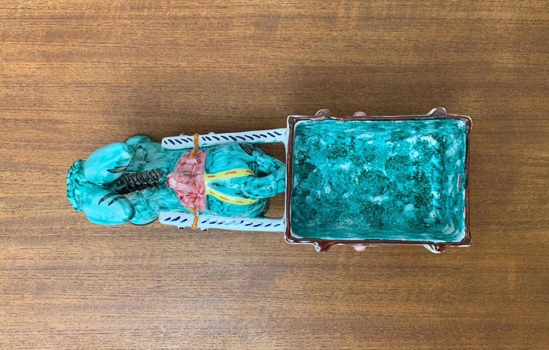 Vintage Italian hand-painted sculpture of a donkey with a cart in the shape of a bowl from Deruta, Italy.