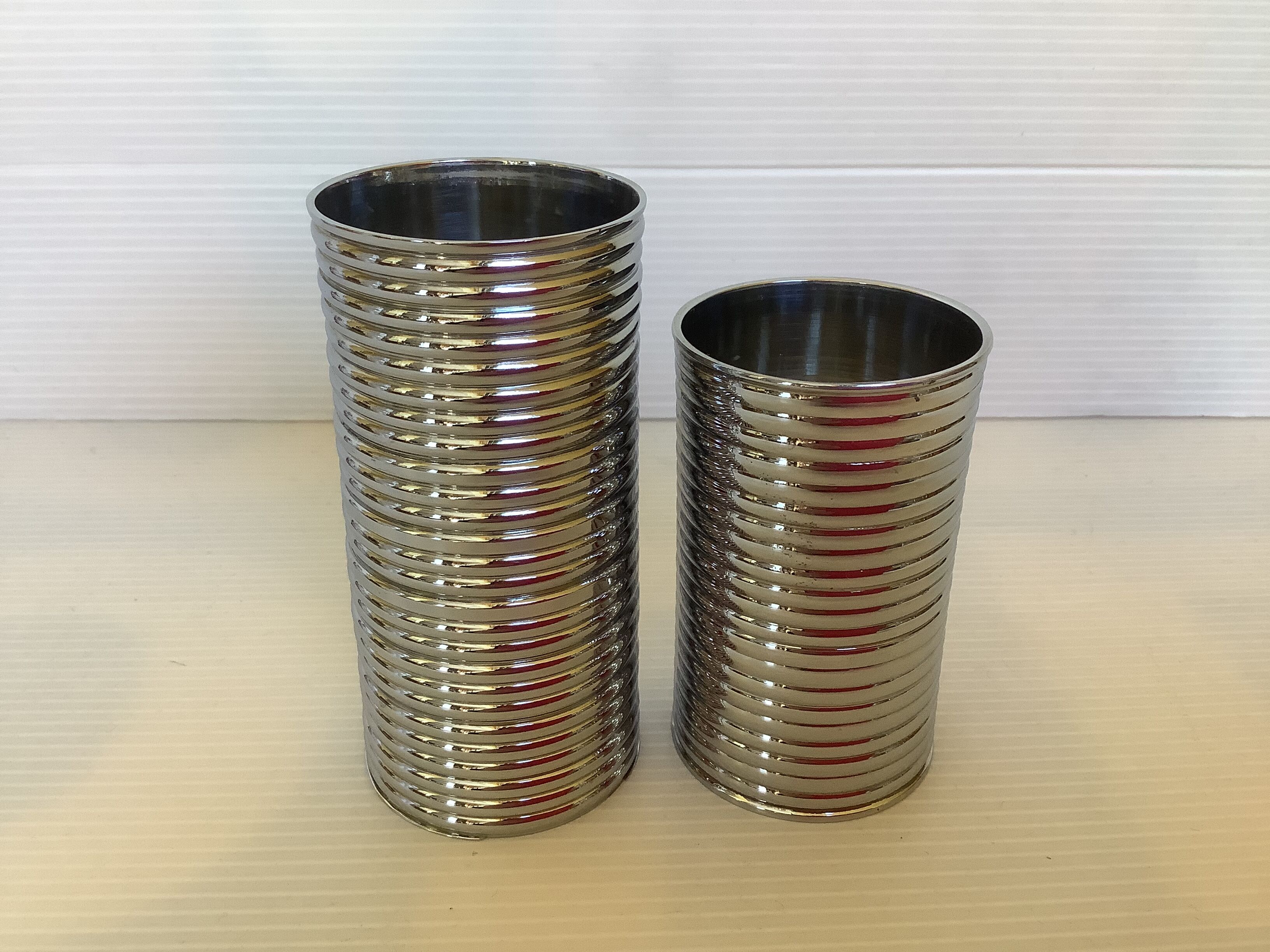 Pair of chrome-plated metal roller holders