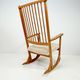 Mid-century rocking chair in pine and sheepskin by Yngve Ekström, Sweden.