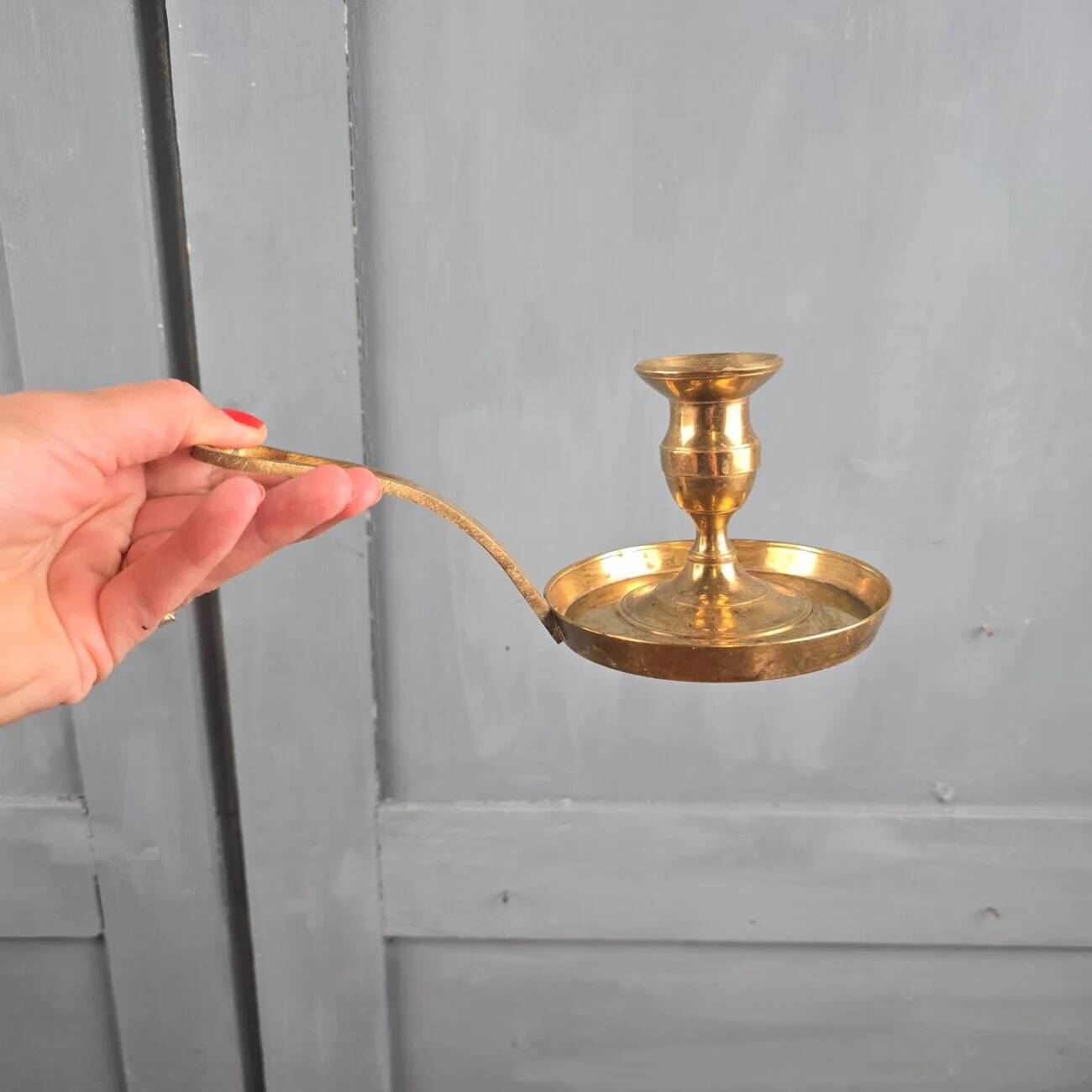 Vintage brass cellar rat, geometric handle in Art Deco style.