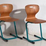 Vintage turquoise blue school chairs (c.1950). Set of 4 pieces