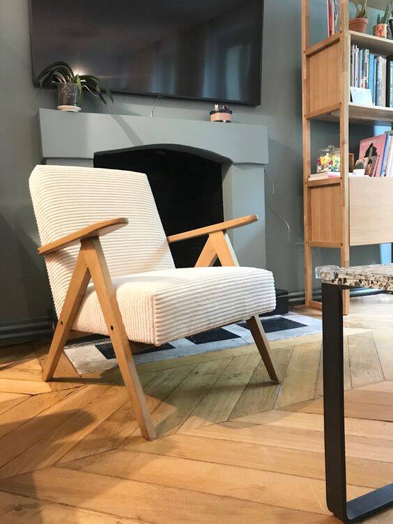 KOMPAS armchairs in grey and white.